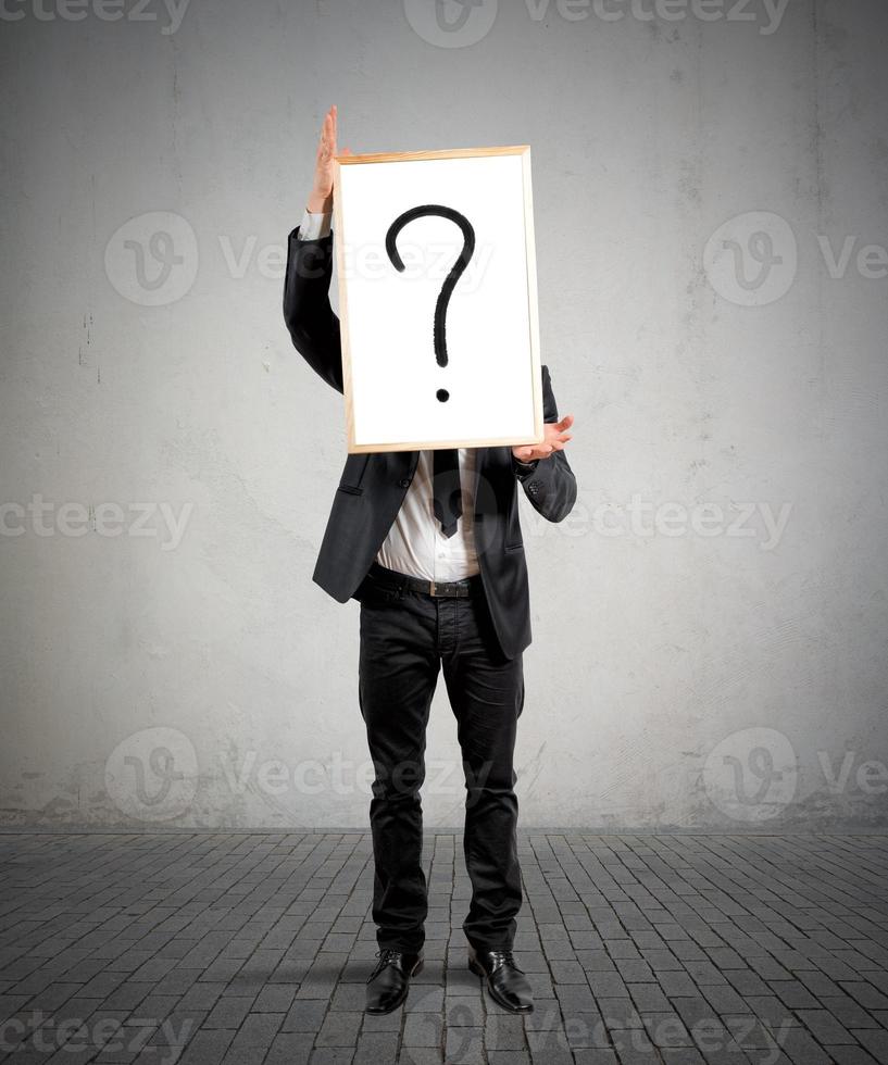 Businessman with doubts photo
