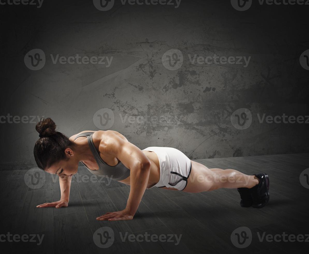 Fitness woman working out photo