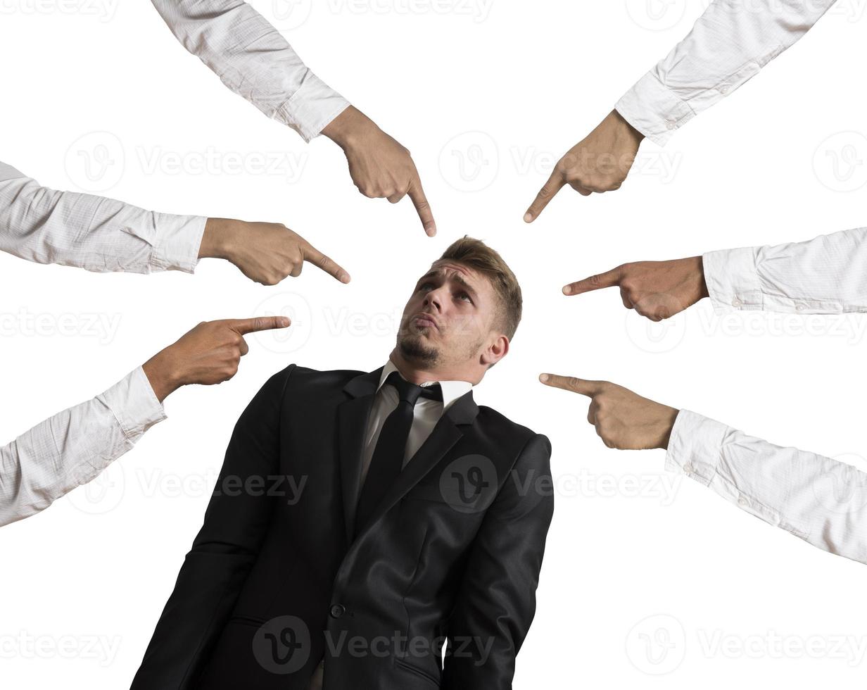 Accused businessman on white background photo