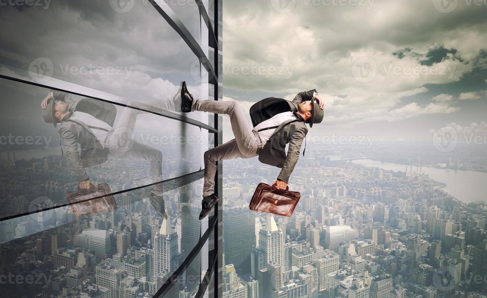 Determinated businessman climbing photo