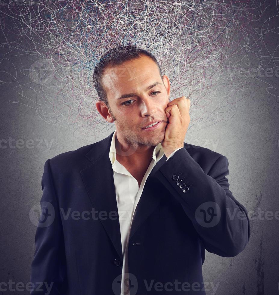 Confused handsome businessman photo