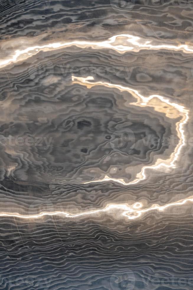 Abstract art grey paint background with light on metal texture. photo