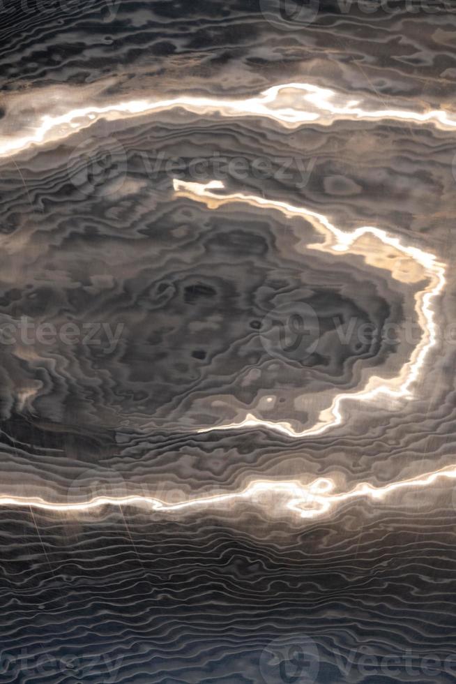 Abstract art grey paint background with light on metal texture. photo