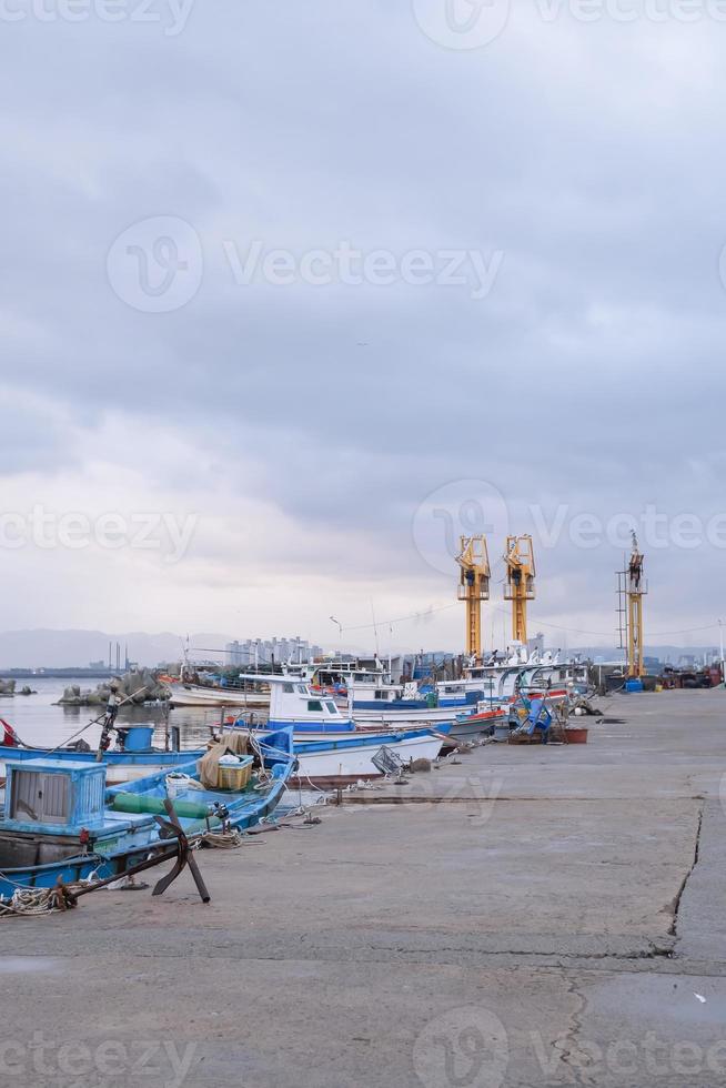 The cloudy afternoon at the fishing pier photo