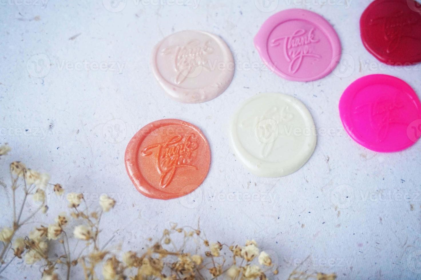 pretty wax coins for a vintage look for wedding or invitation decoration photo