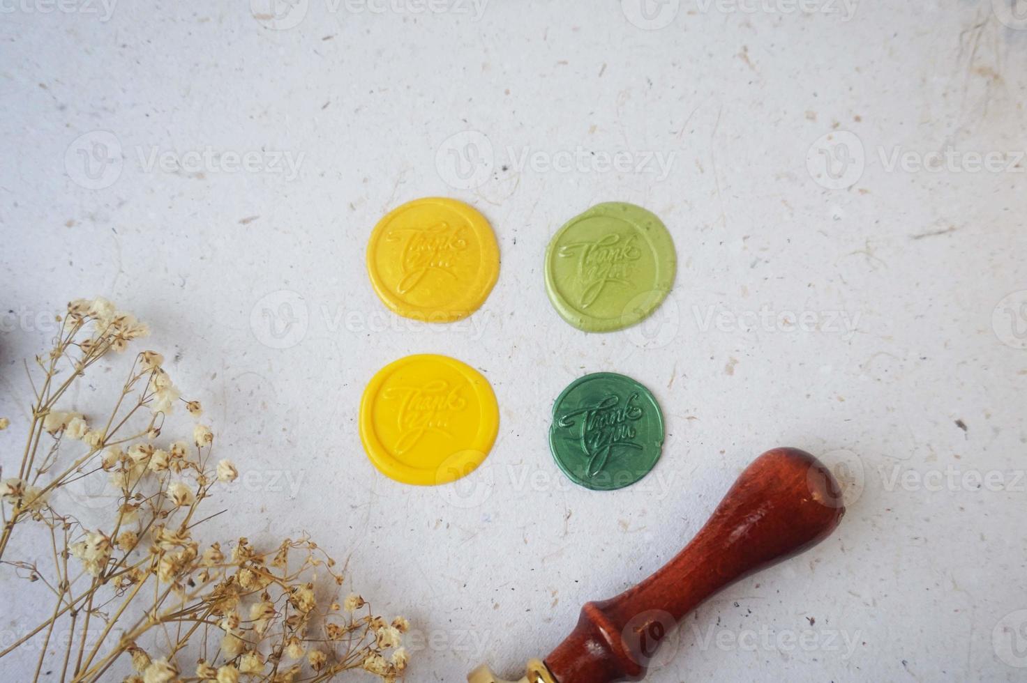 pretty wax coins for a vintage look for wedding or invitation decoration photo