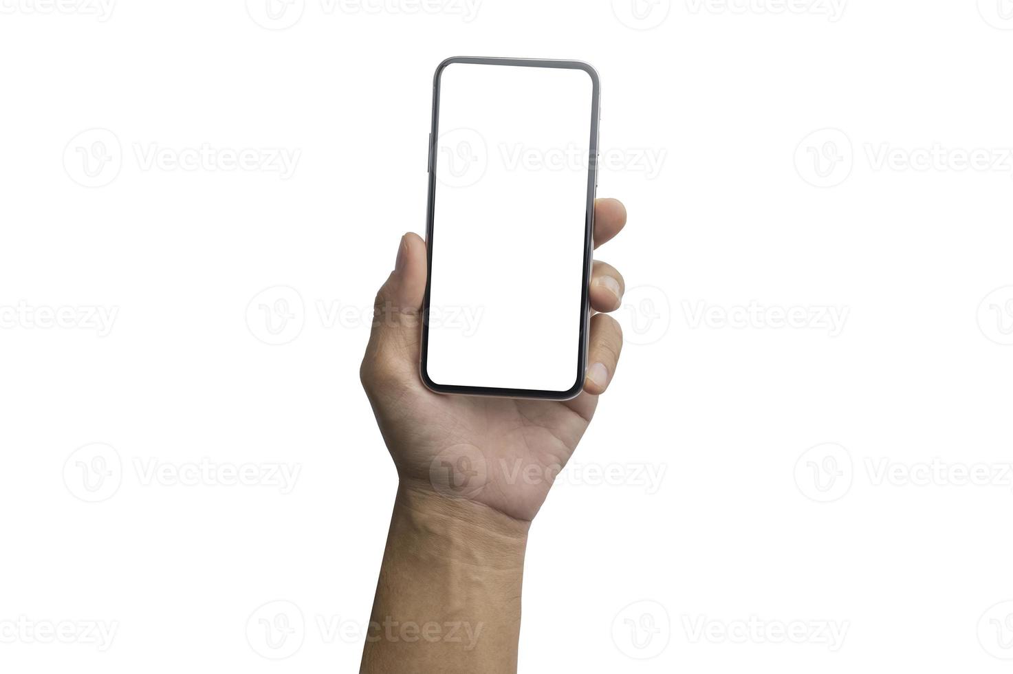 Close up hand holding showing blank empty screen of her smart telephone isolated white color backdrop photo