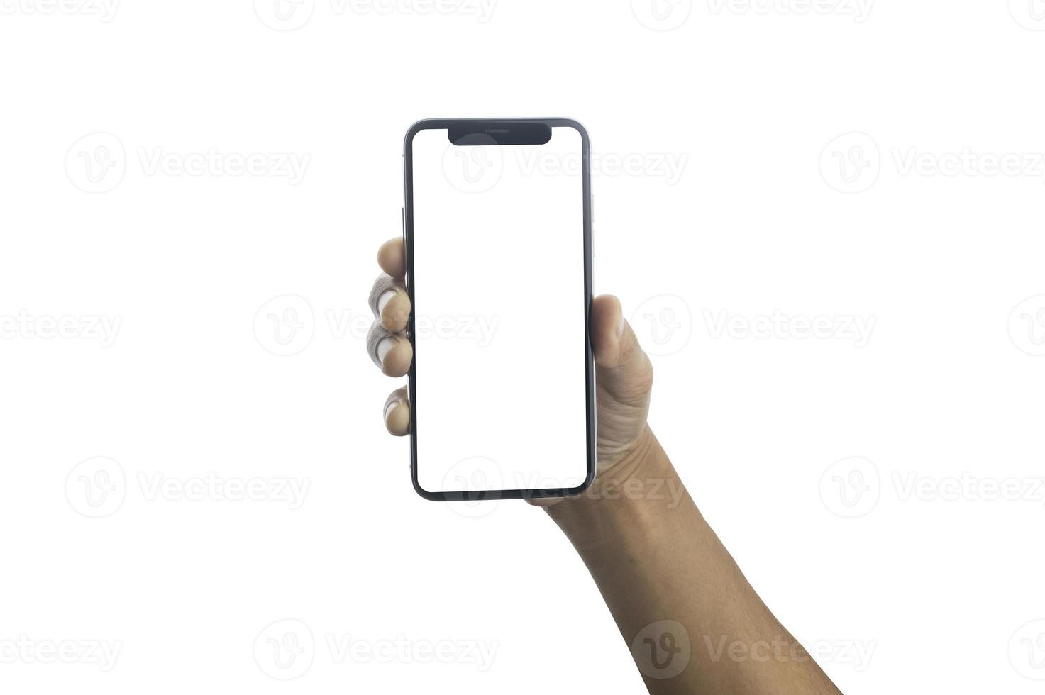 Close up hand holding showing blank empty screen of her smart telephone isolated white color backdrop photo