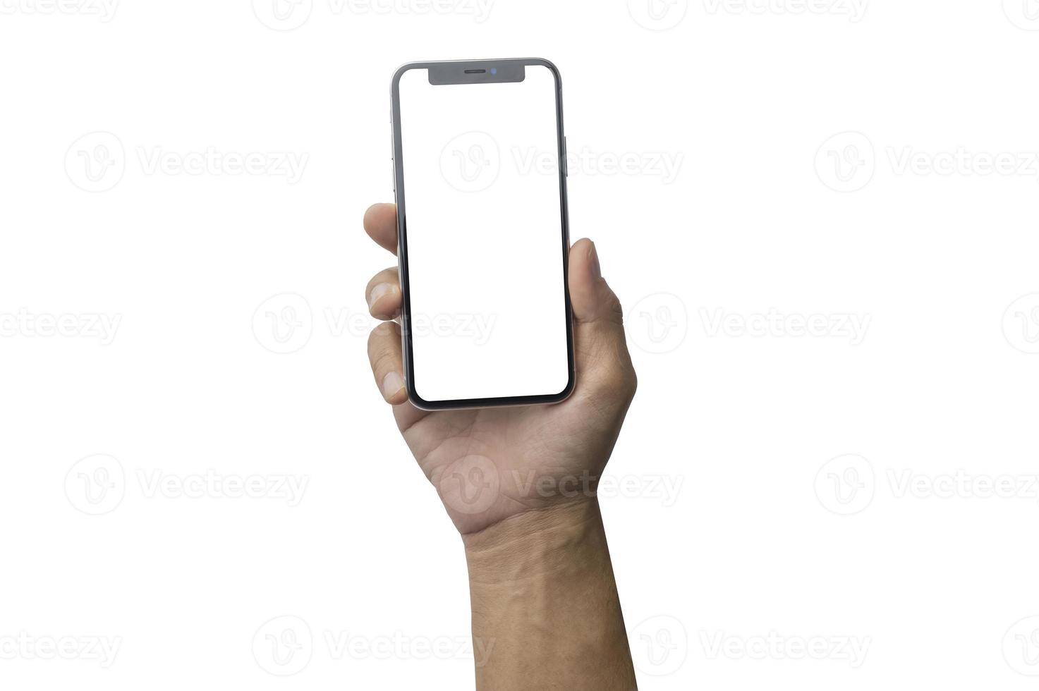Close up hand holding showing blank empty screen of her smart telephone isolated white color backdrop photo