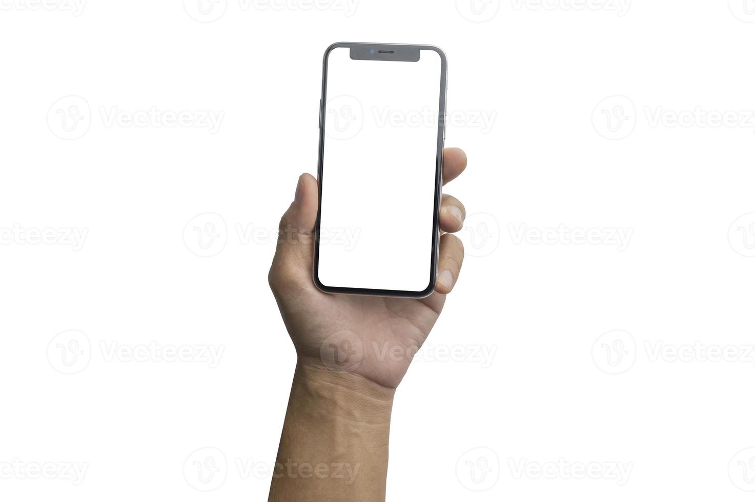 Close up hand holding showing blank empty screen of her smart telephone isolated white color backdrop photo