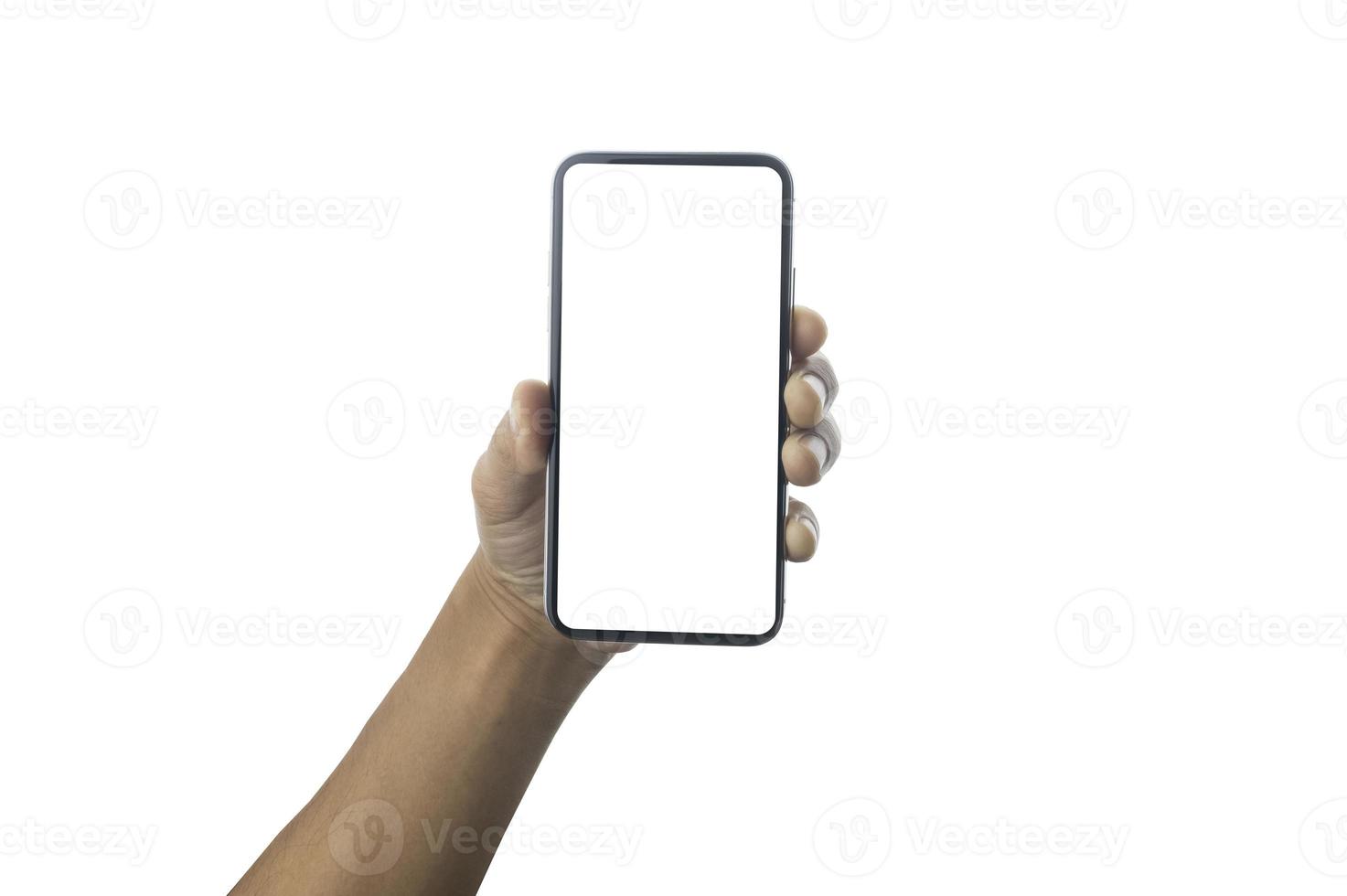 Close up hand holding showing blank empty screen of her smart telephone isolated white color backdrop photo