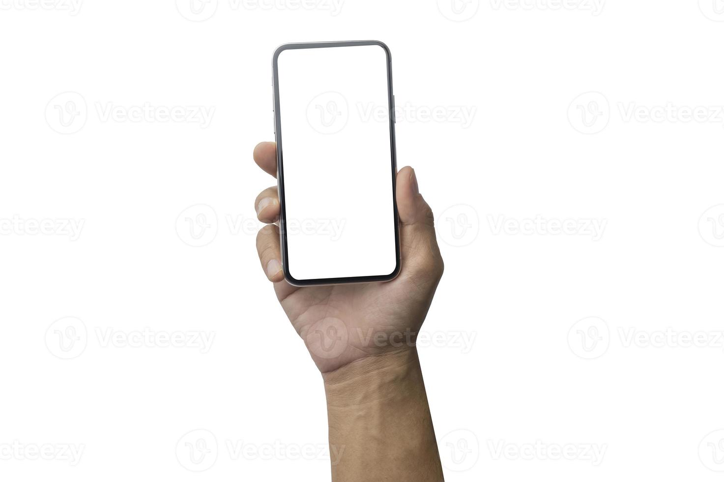 Close up hand holding showing blank empty screen of her smart telephone isolated white color backdrop photo