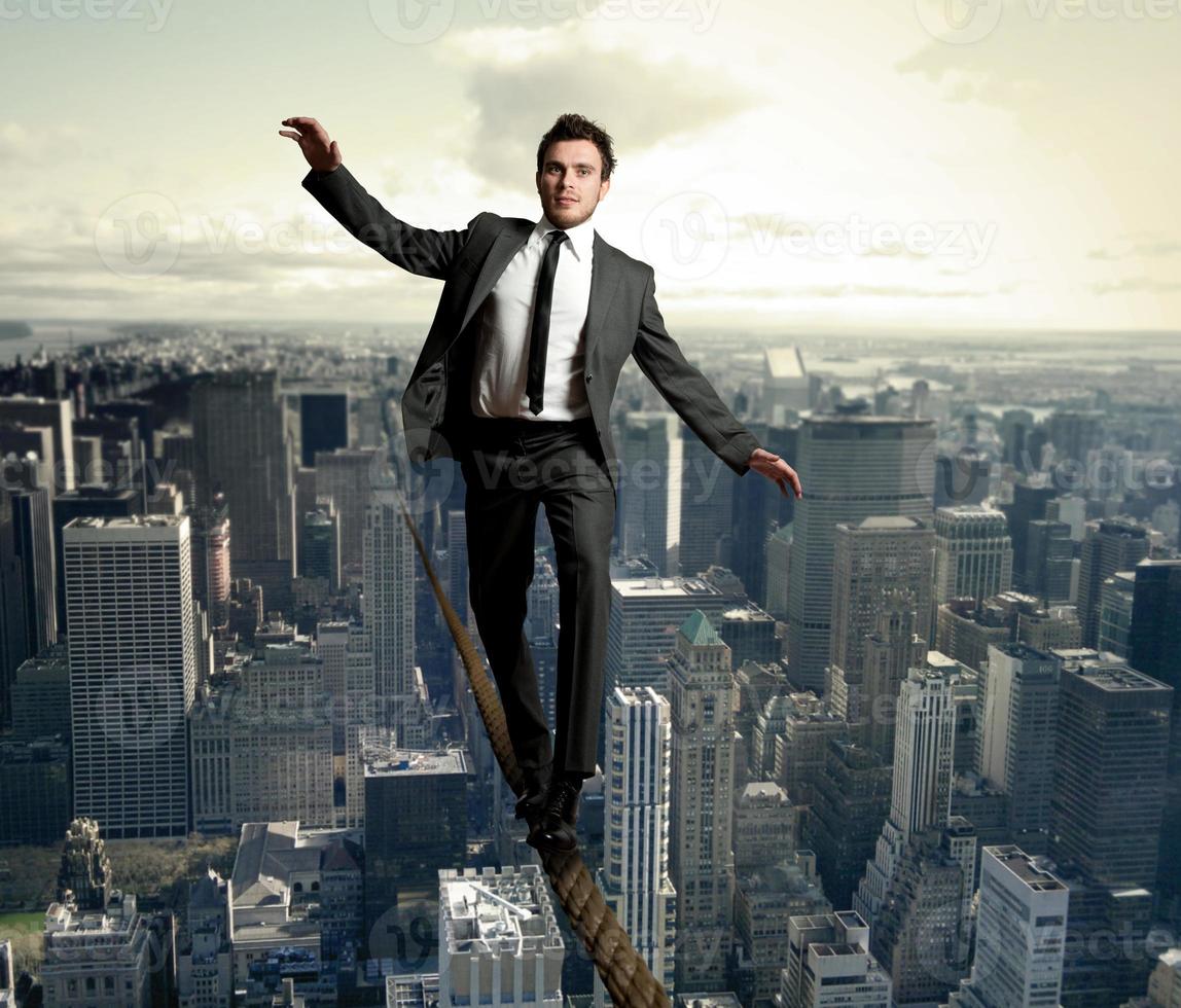 Equilibrist businessman concept photo