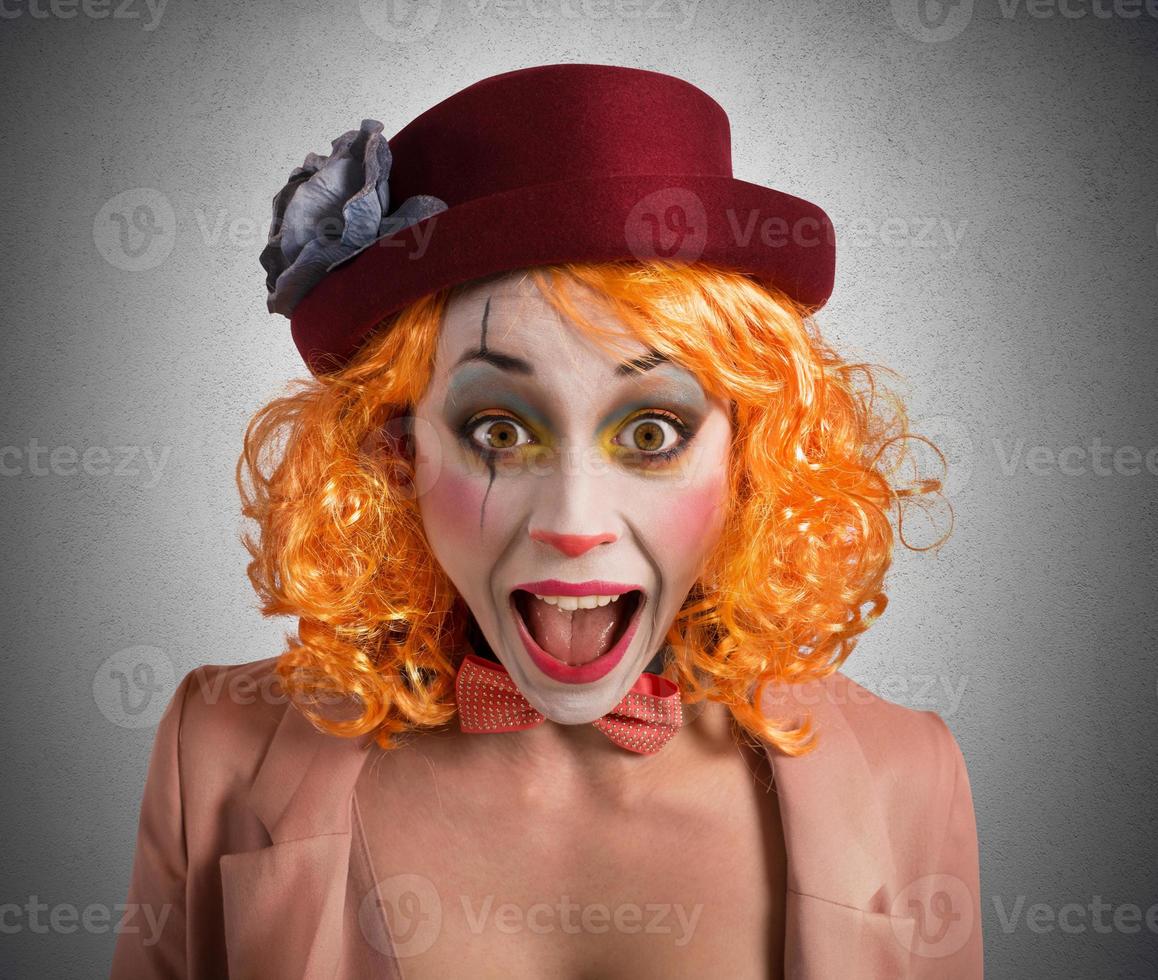Surprised female clown photo