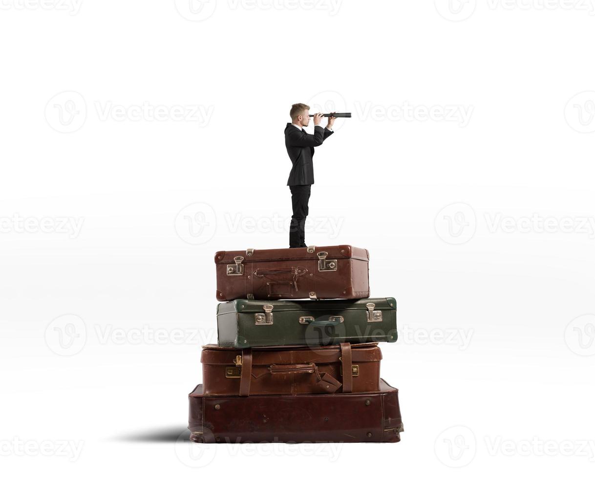 Travel concept with man on books photo
