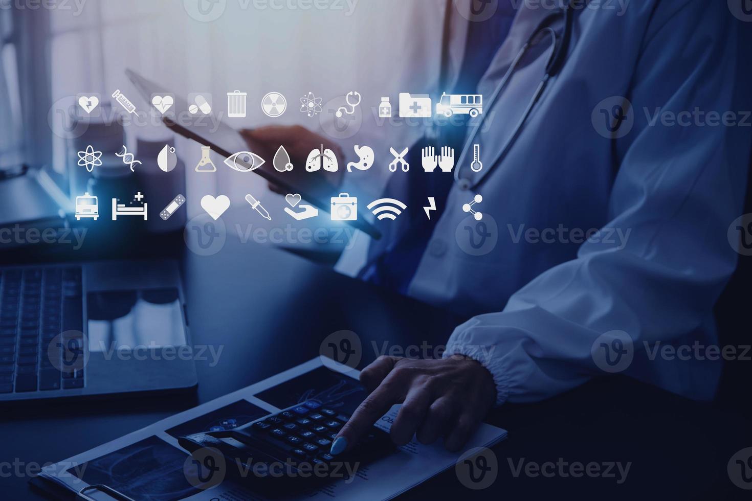 Medicine doctor working with digital medical interface icons on the hospital background, healthcare and Medical technology and network concept. photo