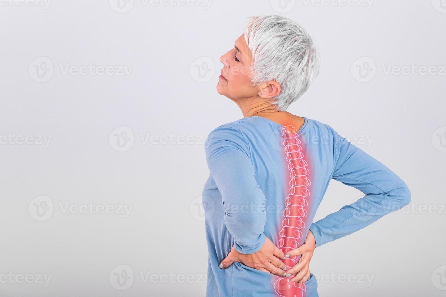 Matur Woman suffering from lower back pain. Mature woman resting with back pain. Female lower back pain. Senior woman injury suffering from backache, Spine in 3d photo