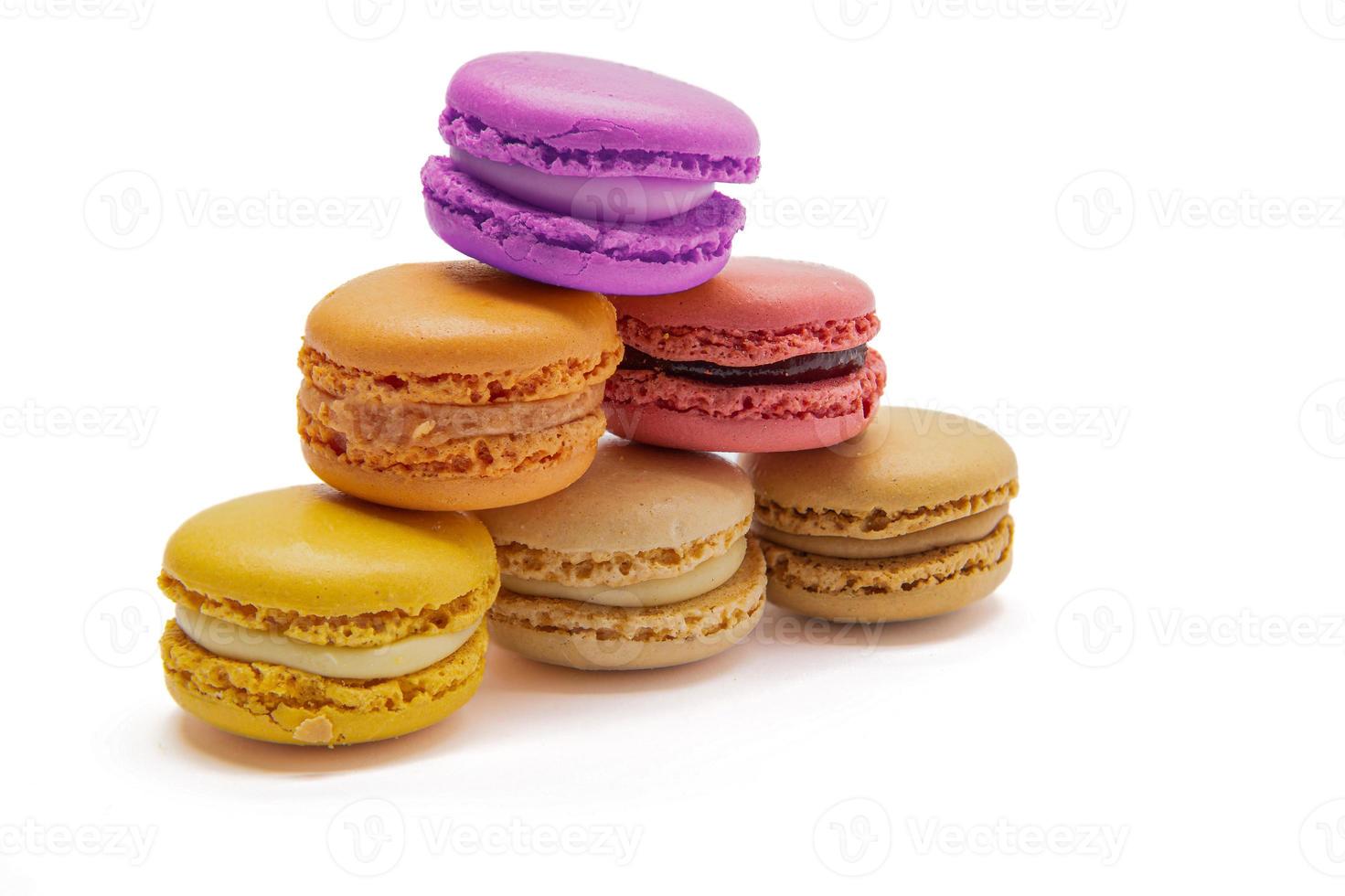 Triangle stack of macaroons isolated on a white background. photo