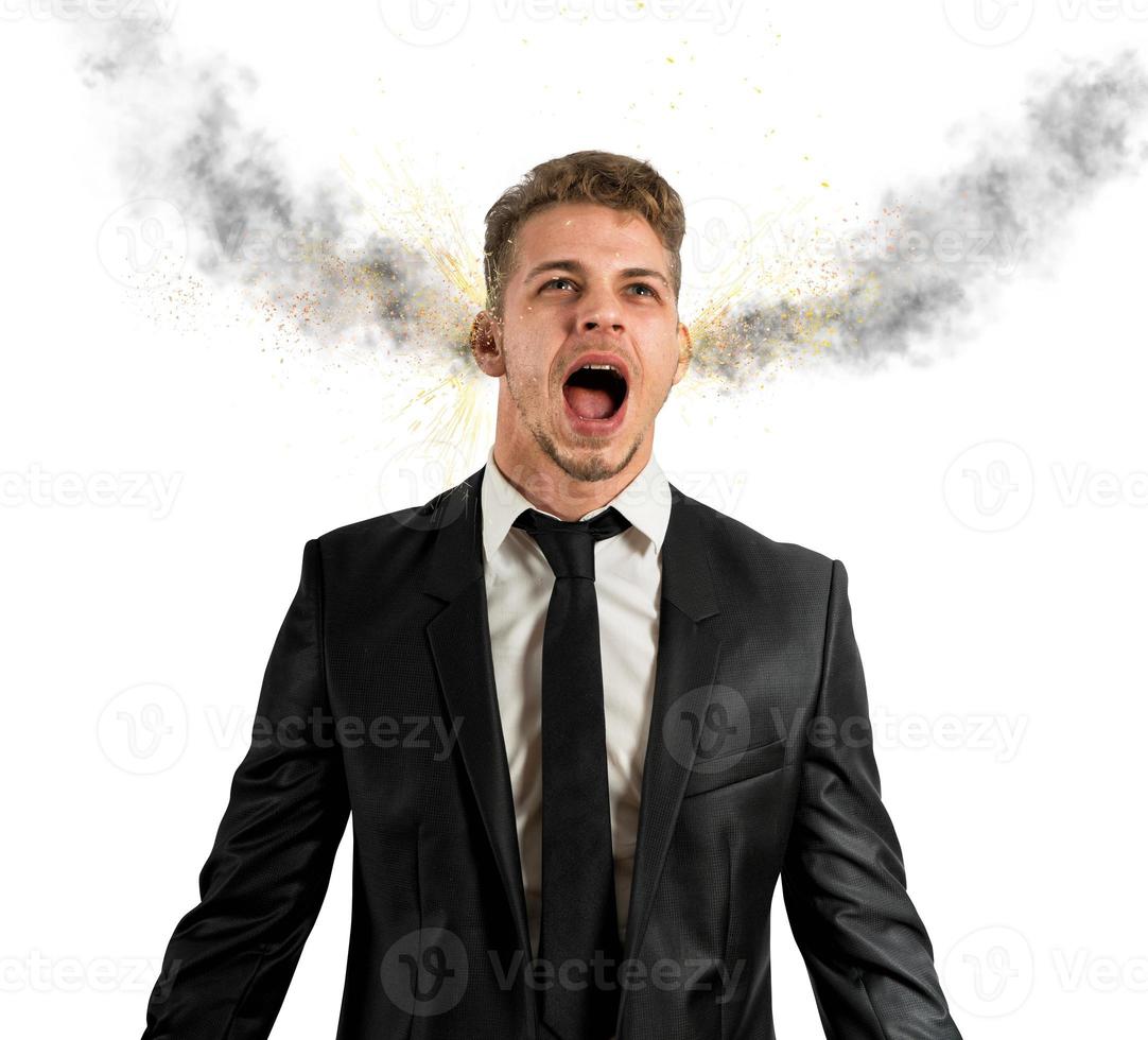 Stressed businessman screaming photo
