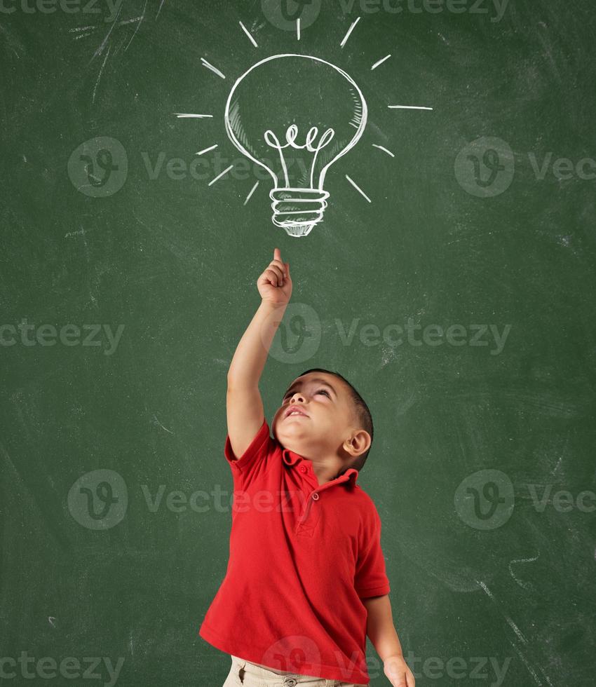 Genius child with an idea photo