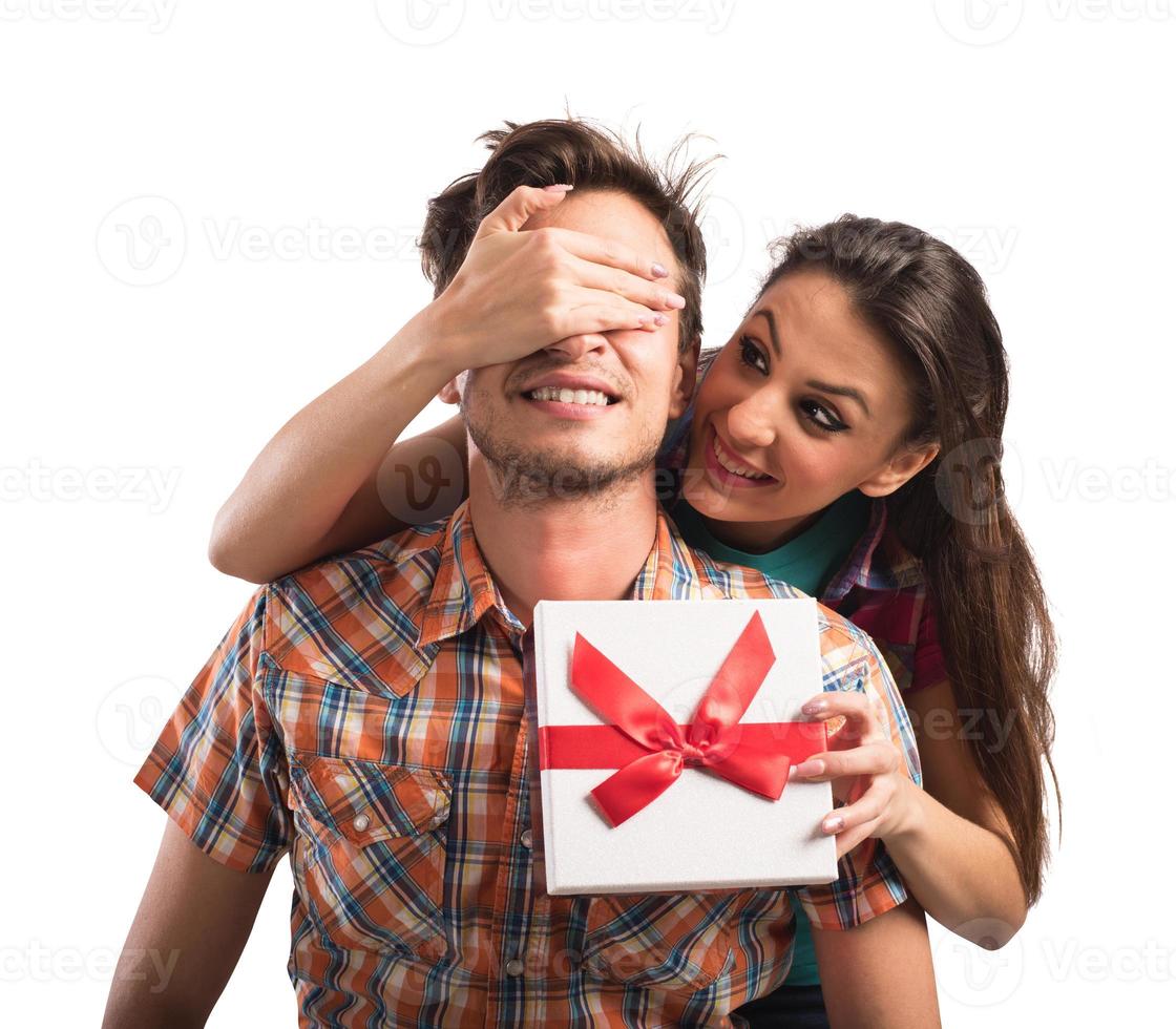 Gift surprise between a couple photo