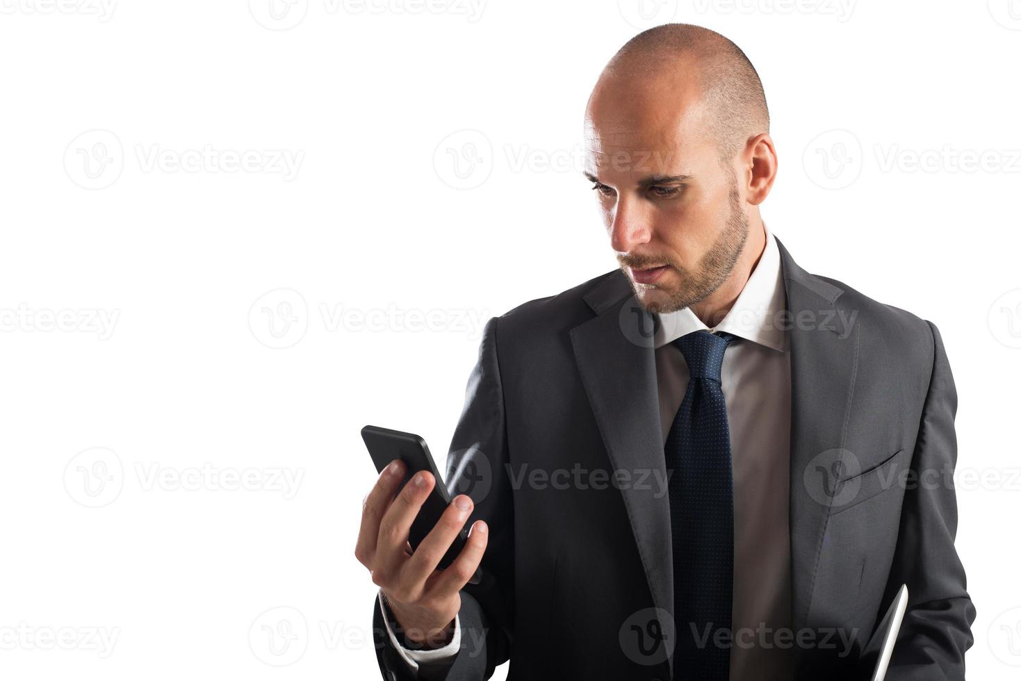 Businessman on the cellphone photo