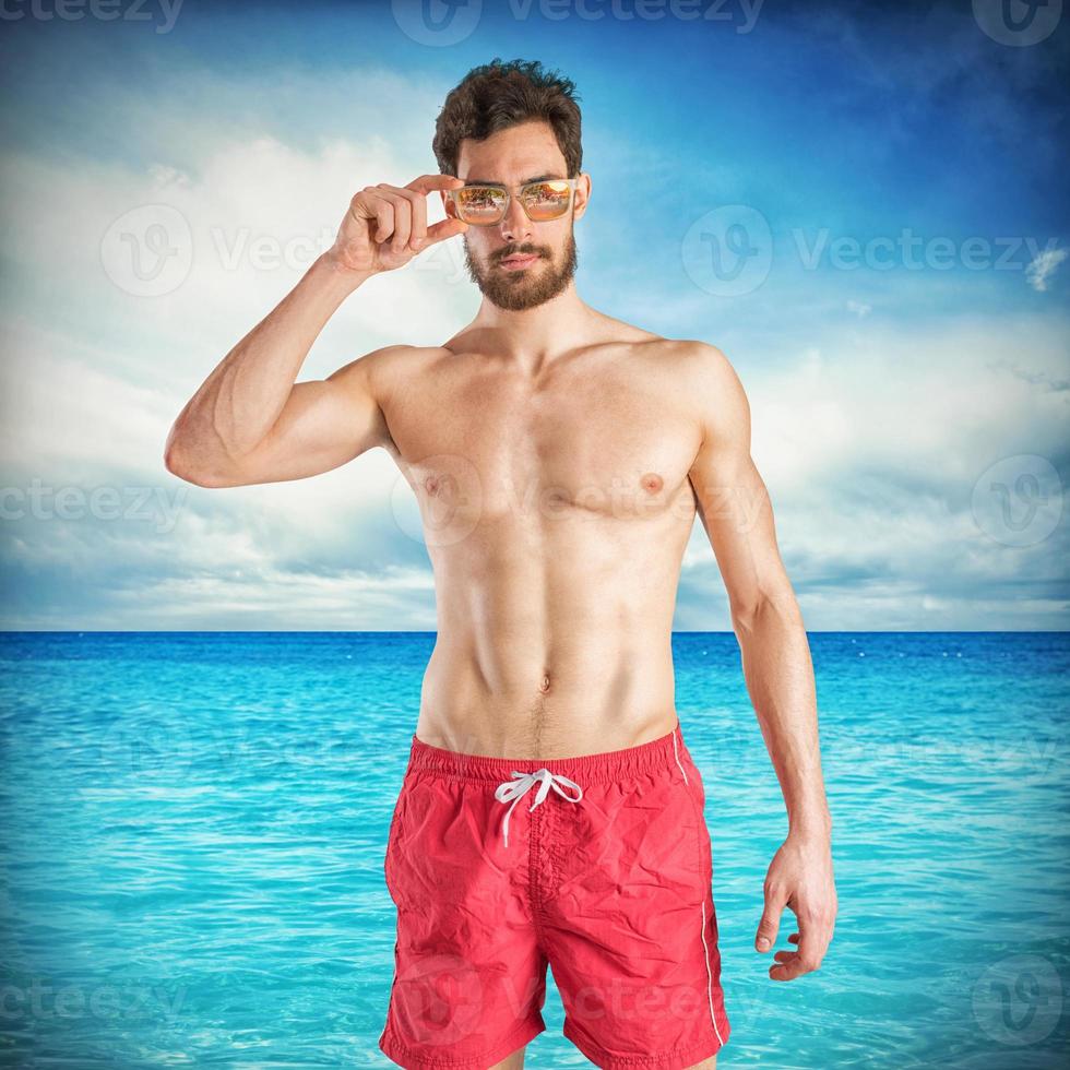 Man on the beach photo