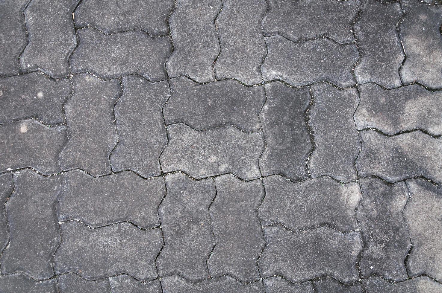 cobblestone background,Stone paving texture. Abstract pavement background photo