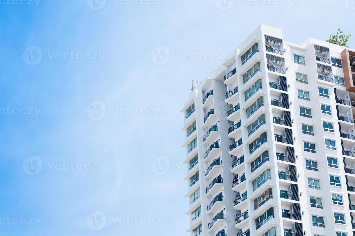 New building architecture on blue sky background,Low angle architectural exterior view of modern photo