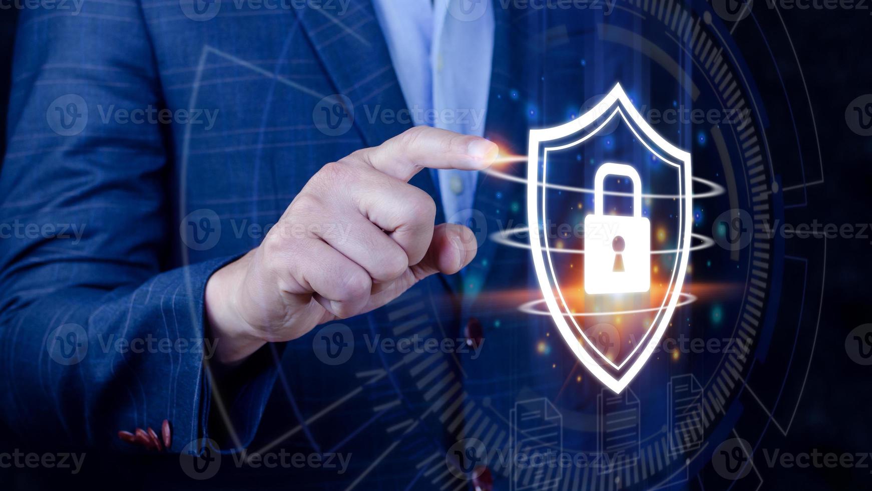 Computer network protection, secure and safe your data concept, businessman holding shield protection icon, Security shield Lock Security Businessman Protect Concept photo