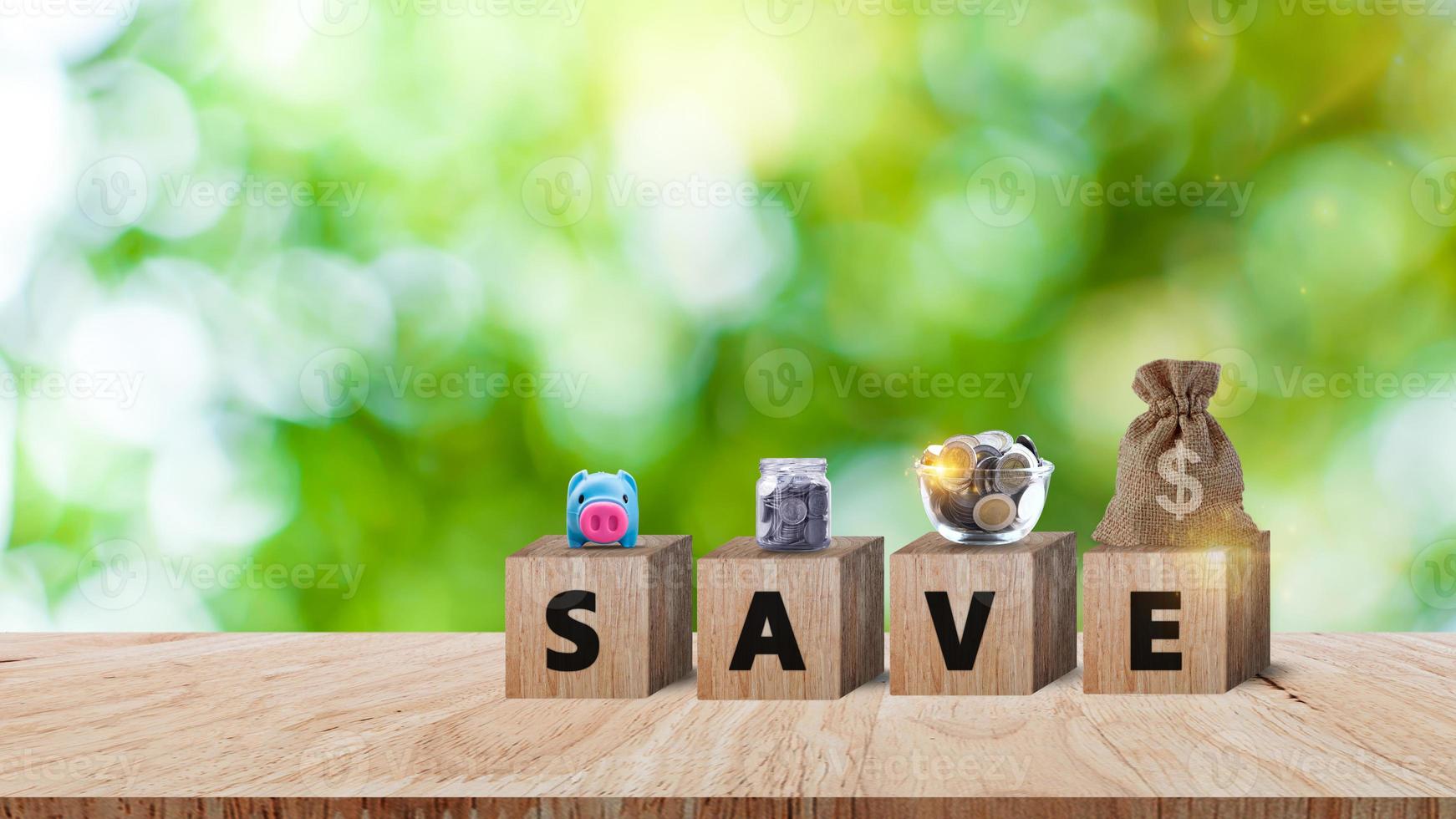 Wooden blocks with words save and money bag with Coins for investment loan planned future concept. saving, charity, family finance plan concept, fundraising, superannuation, financial crisis concept photo