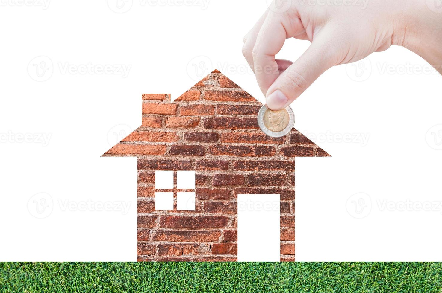 Coin Hand holding house icon in nature as symbol of mortgage,Dream house on nature background, isolated on white background photo