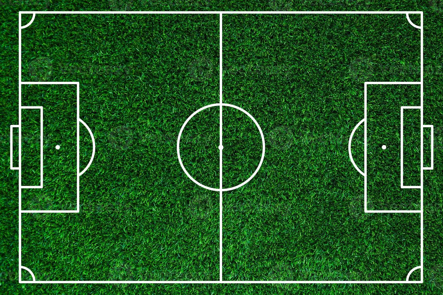 Abstract green grass football field of artificial grass background texture,Soccer. Playing field of football. betting and competition. White lines that delimit the areas,Football field Top view photo