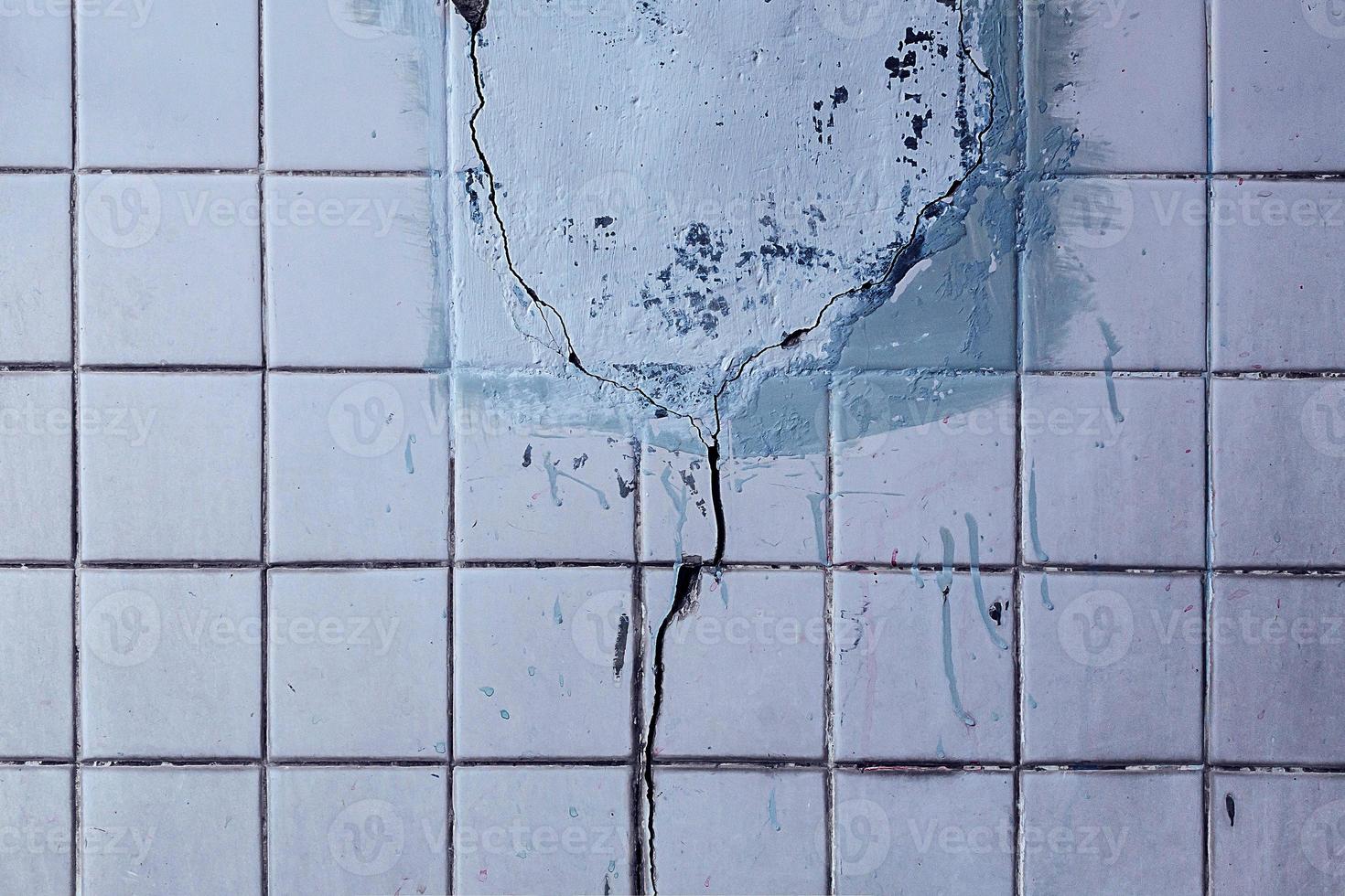 Cracked old grunge ceramic tile wall texture background,Abstract background photo
