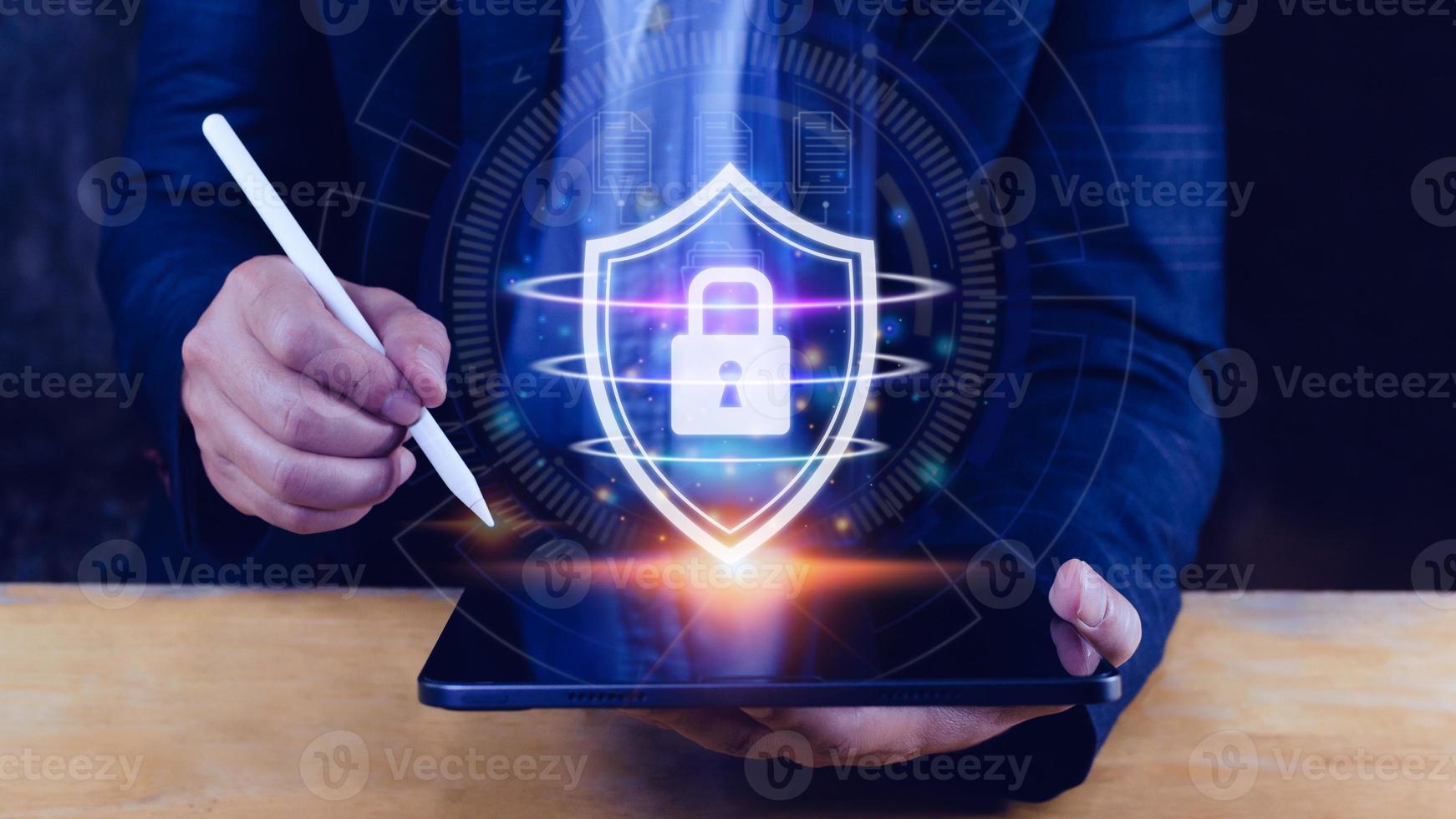 Computer network protection, secure and safe your data concept, businessman holding shield protection icon, Security shield Lock Security Businessman Protect Concept photo