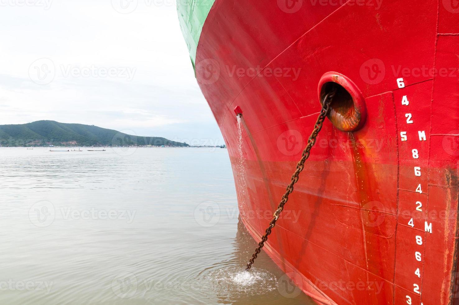 part of ship Large cargo ship  with many shipping container in harbor ,ship in harbor thailand photo