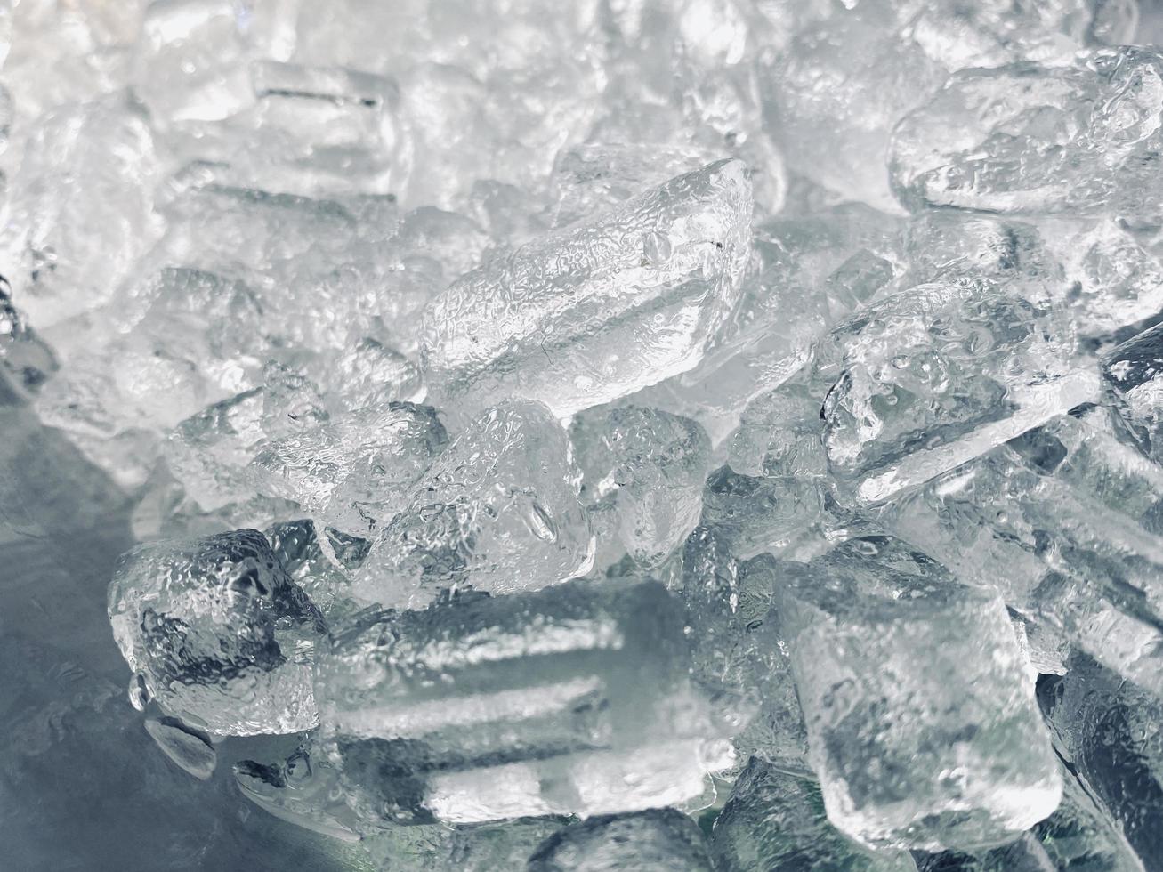 Ice cubes background, ice cube texture or background It makes me feel fresh and feel good, In the summer, ice and cold drinks will make us feel relaxed, Made for beverage or refreshment business. photo