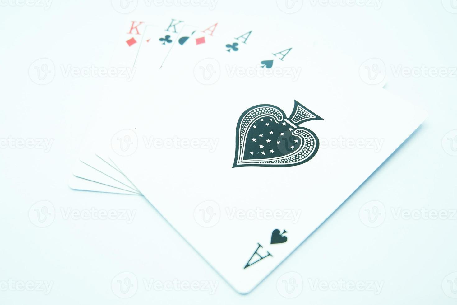 Full House ,Three of ace and a pair of King in white background photo