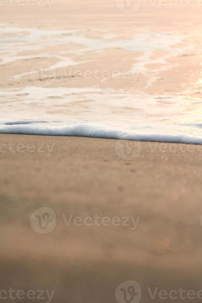 The sun is rising, the sun is bright, the morning sea at Cha-Am Beach photo