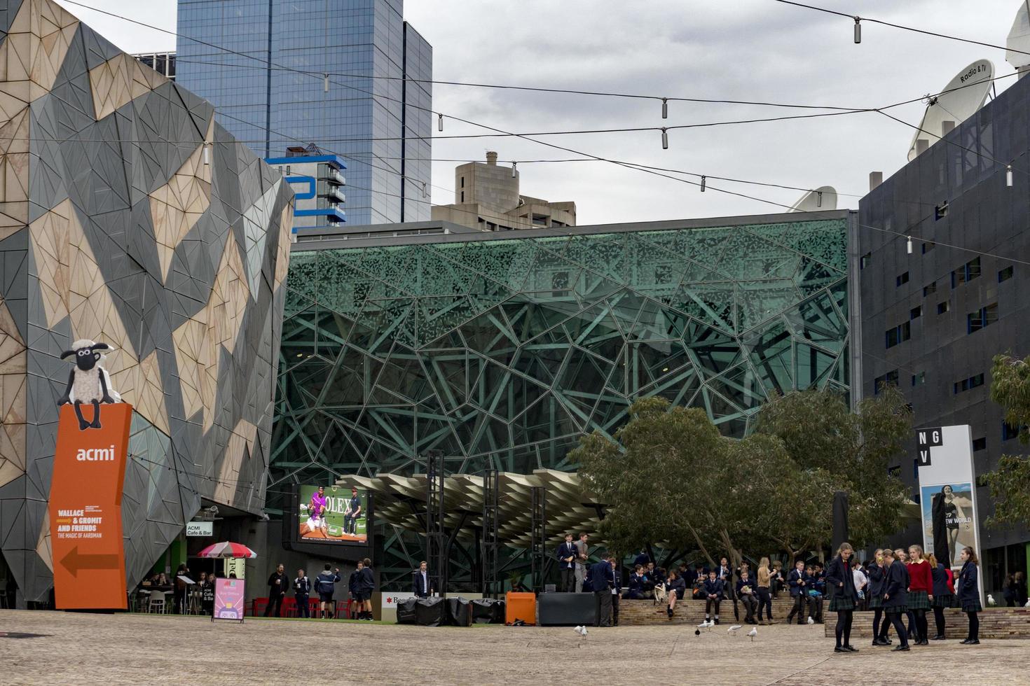 MELBOURNE, AUSTRALIA - AUGUST 15 2017 - Tourist and students in Federation Square photo