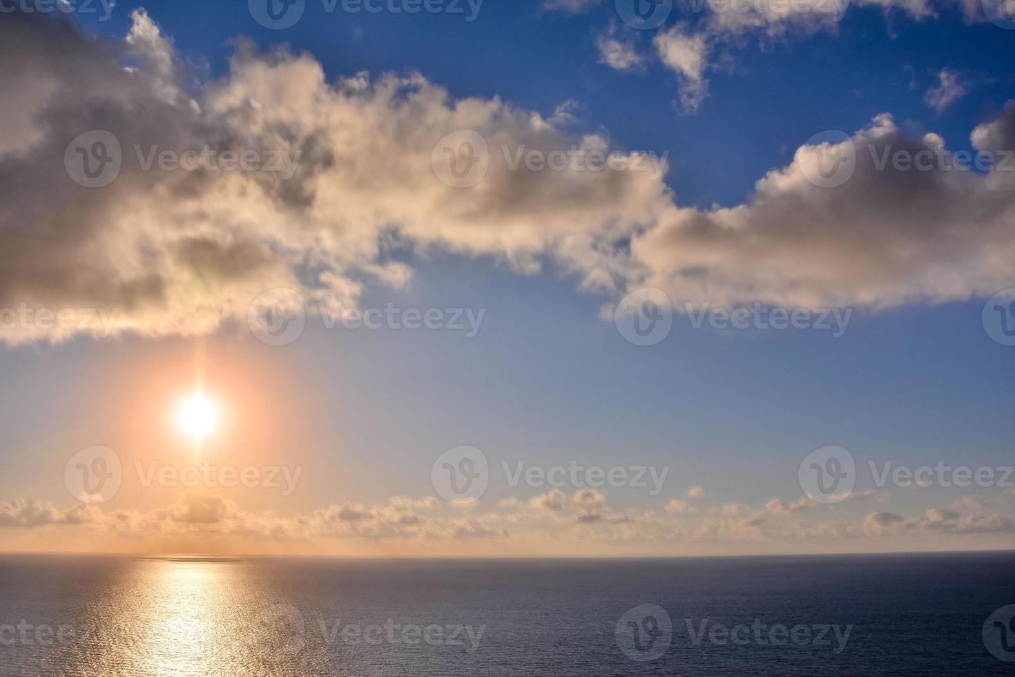 Sunset over the sea photo