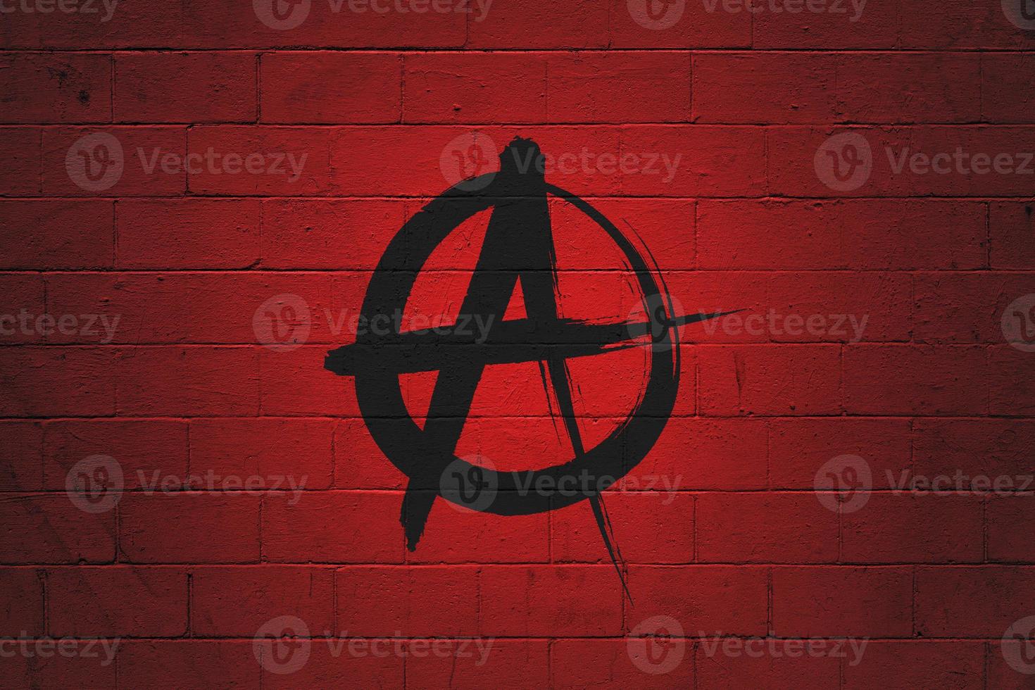 Flag of Anarchist painted on a wall photo