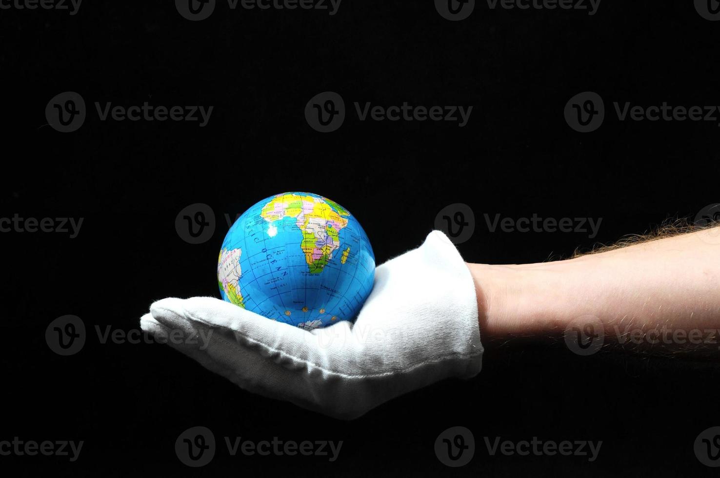 Globe on dark background photo