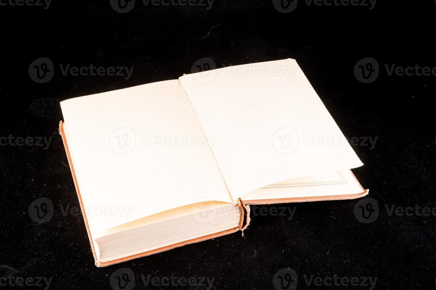 Book on dark background photo