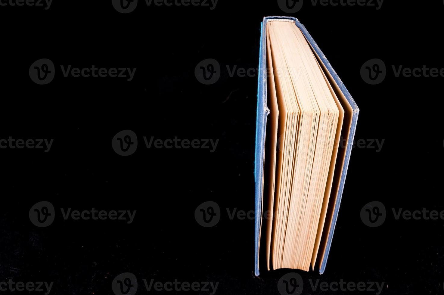 Book on dark background photo