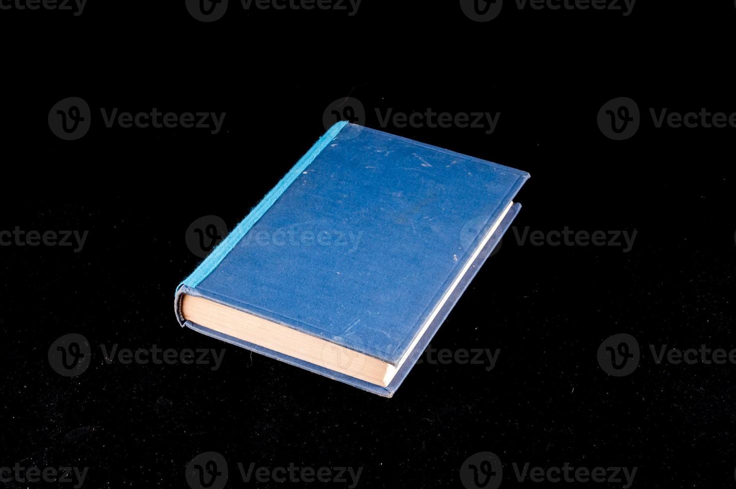 Book on dark background photo
