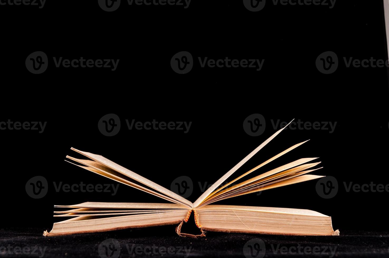 Book on dark background photo