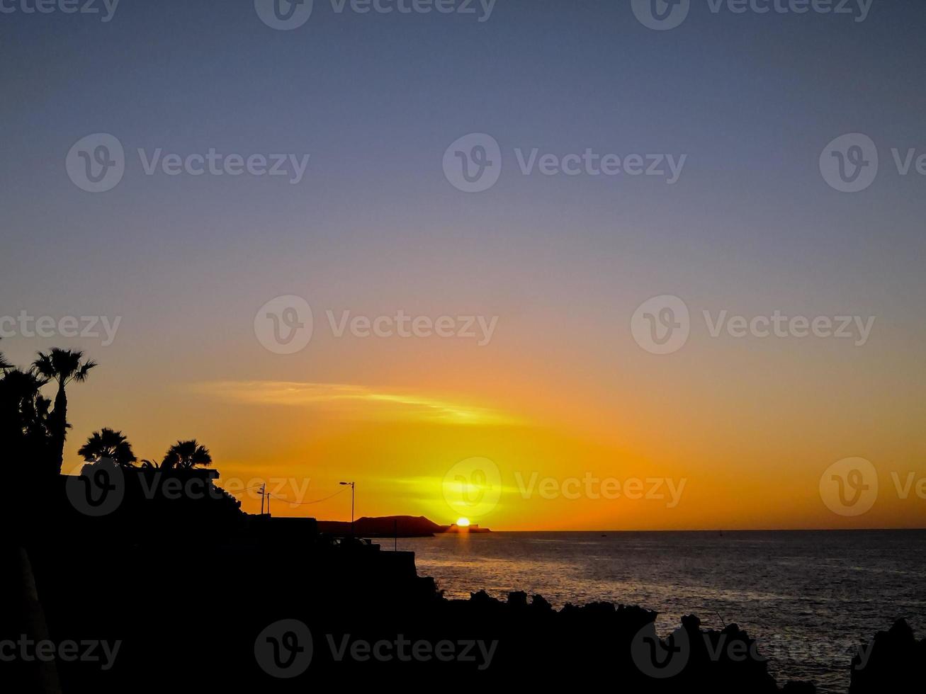 Sunset over the sea photo