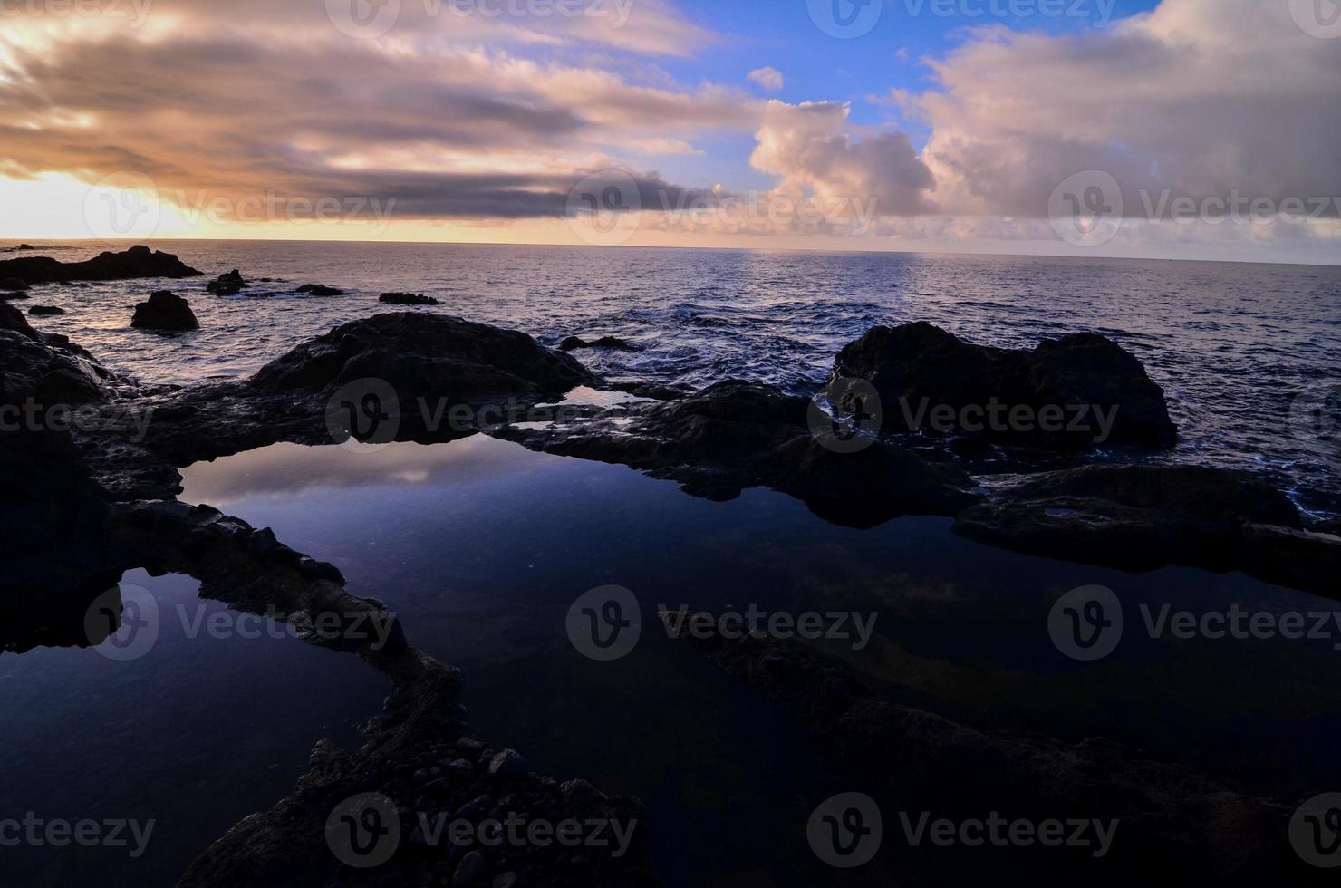 Sunset over the sea photo
