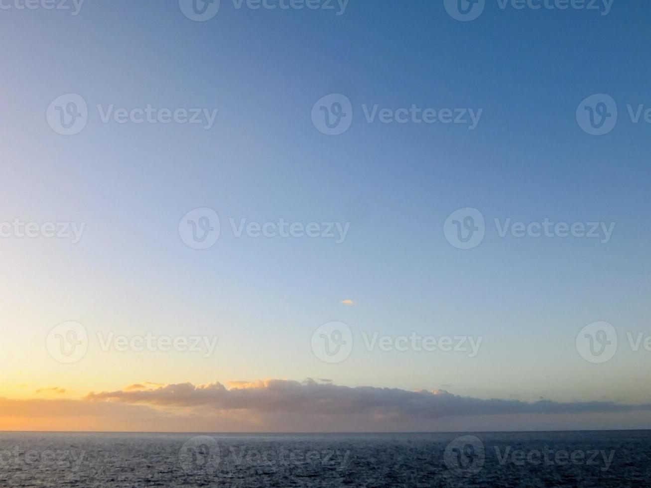 Sunset over the sea photo